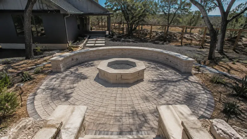 Custom stone fire pit in Spring Branch, TX by CJK Landscaping – project photo 7