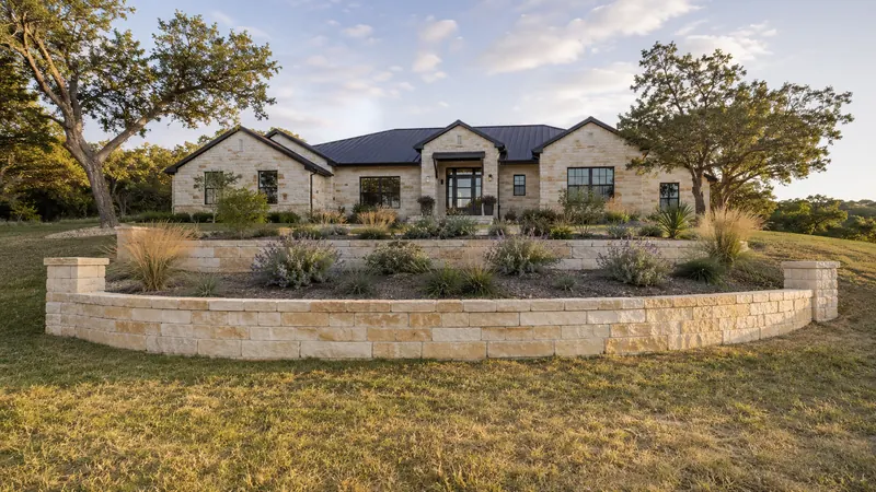 Limestone retaining wall in Spring Branch, TX by CJK Landscaping – project photo 1