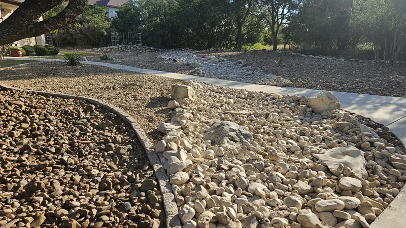 Dry creek bed drainage installation in Spring Branch, TX by CJK Landscaping