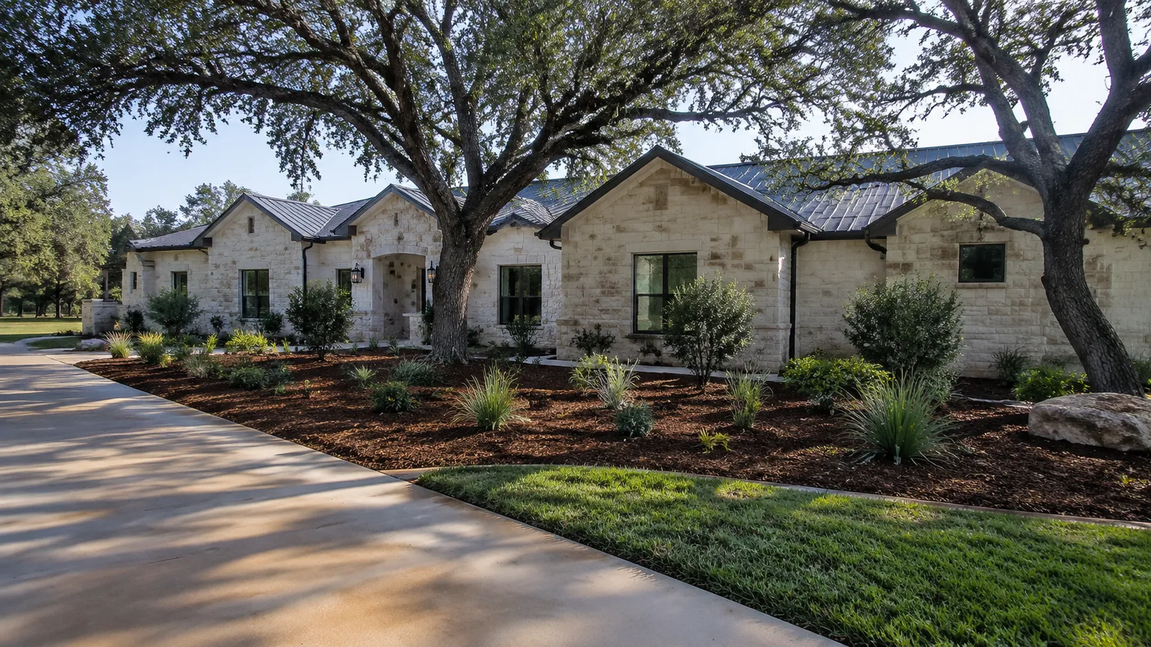 New mulch bed creation around plantings in Spring Branch, TX by CJK Landscaping
